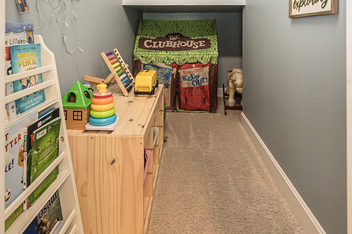 Kids will love their own play area tucked beneath the stairs.