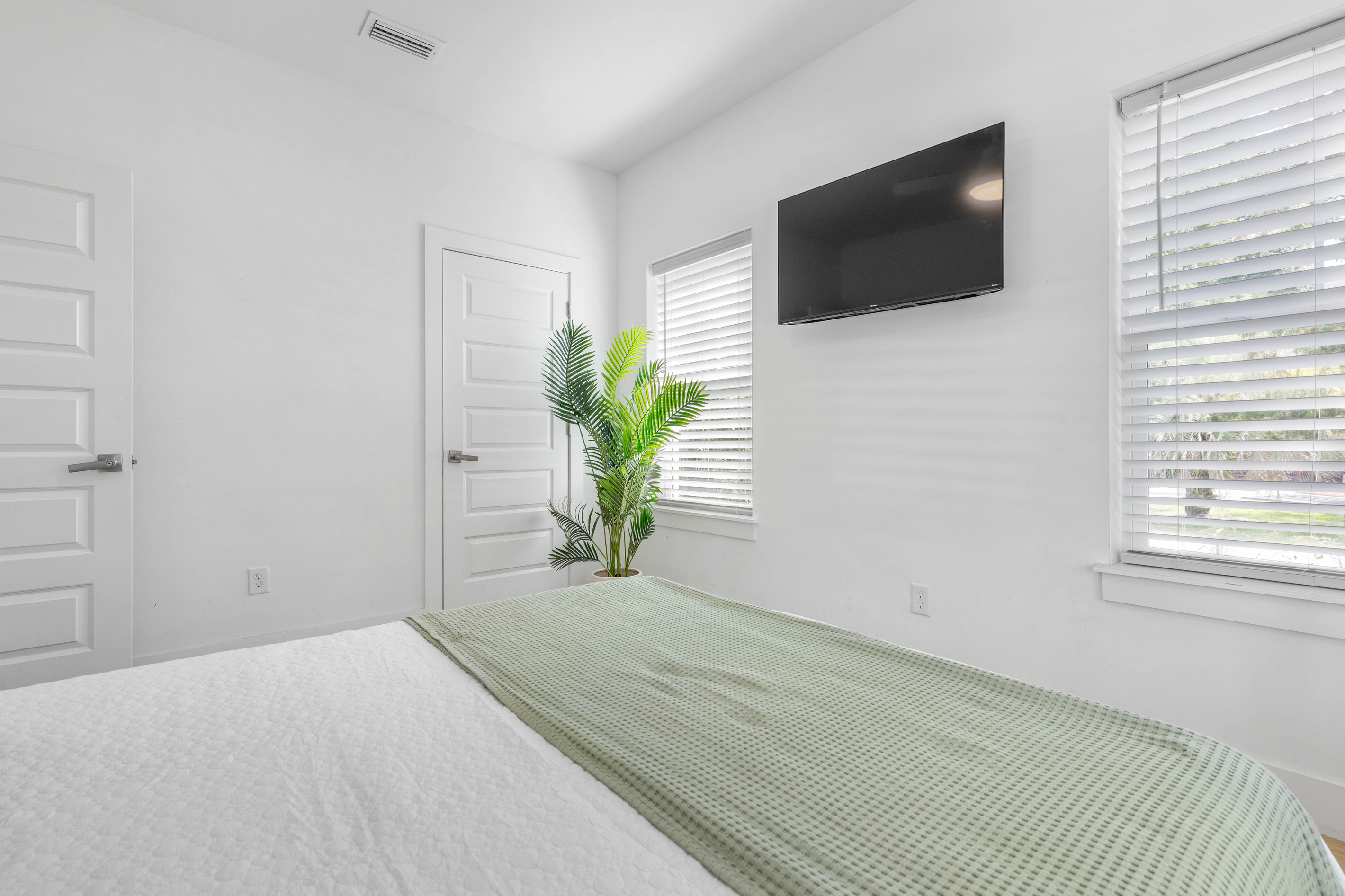 A closet with real hanging space, which matters when a family unpacks for a week rather than a weekend. The television is set for the end of the day, when everyone retreats to their own corner of the house.