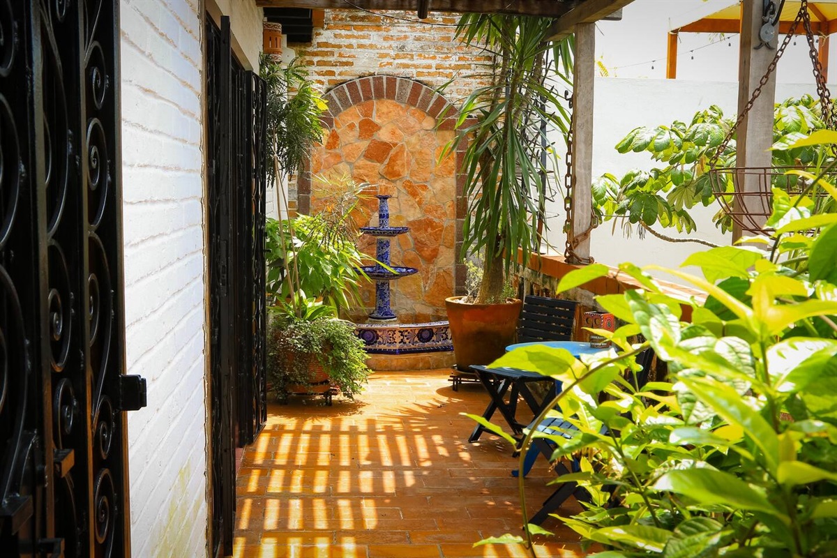 Private outdoor patio with beautiful fountain.