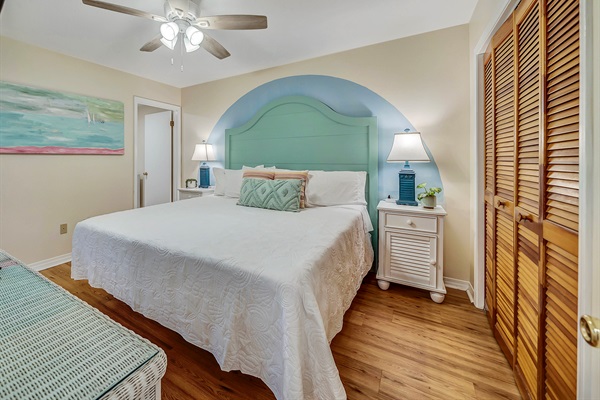 Primary bedroom with king bed.