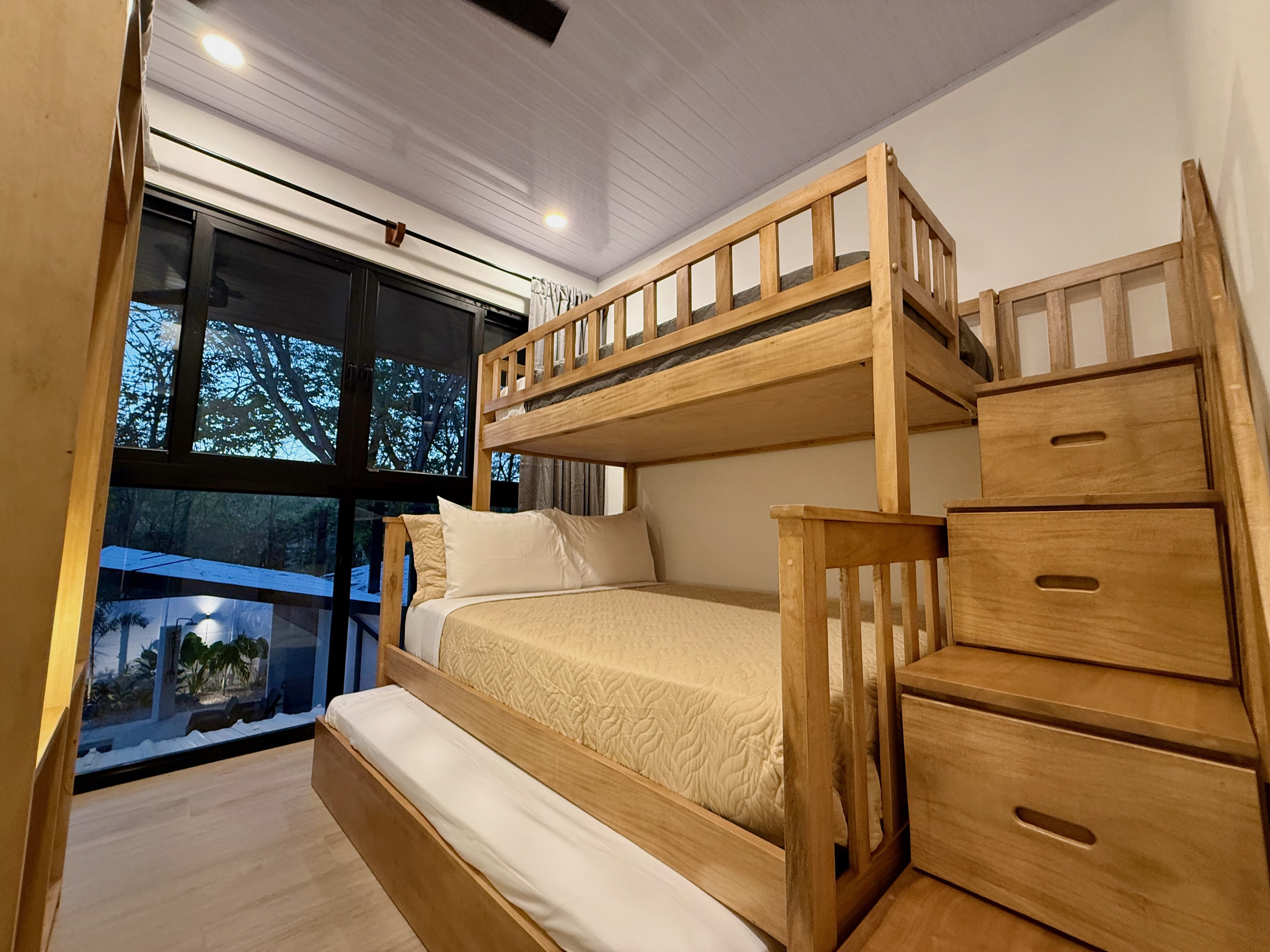 Extra pull-out bed below. Great for toddlers!