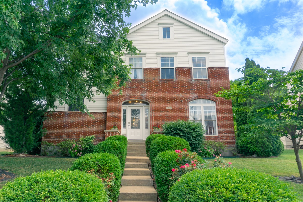 Charming brick-front home in a quiet St. Louis neighborhood - your getaway starts here.