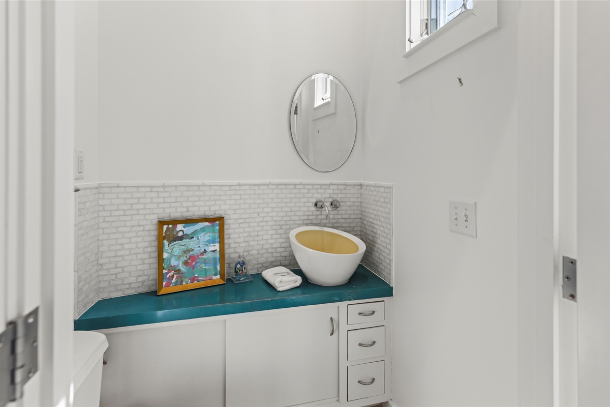 Laundry Hall/Bathroom Leads to Backyard