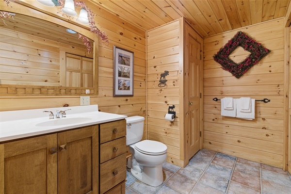 A full bathroom designed to make group stays easy and convenient.