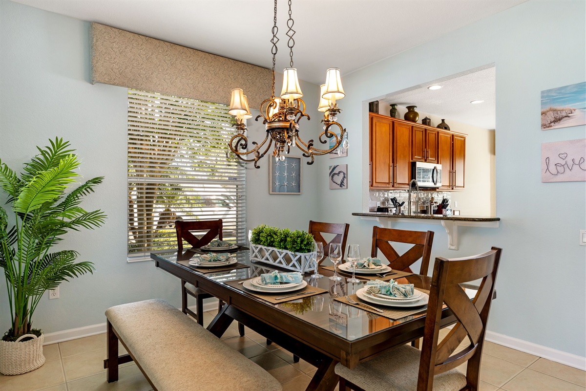 Pass thru kitchen window makes gathering easy to coordinate.