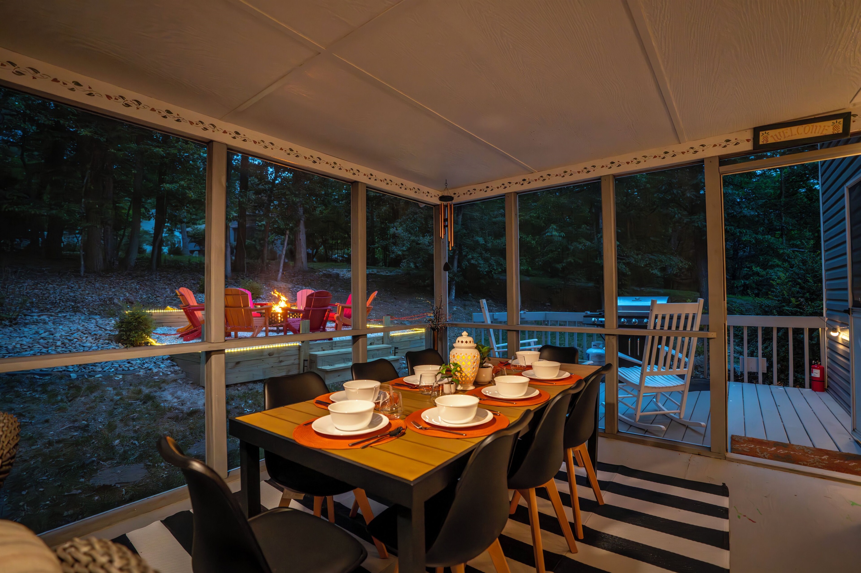 Screened in porch with dining for 8 plus additional comfy seating area
