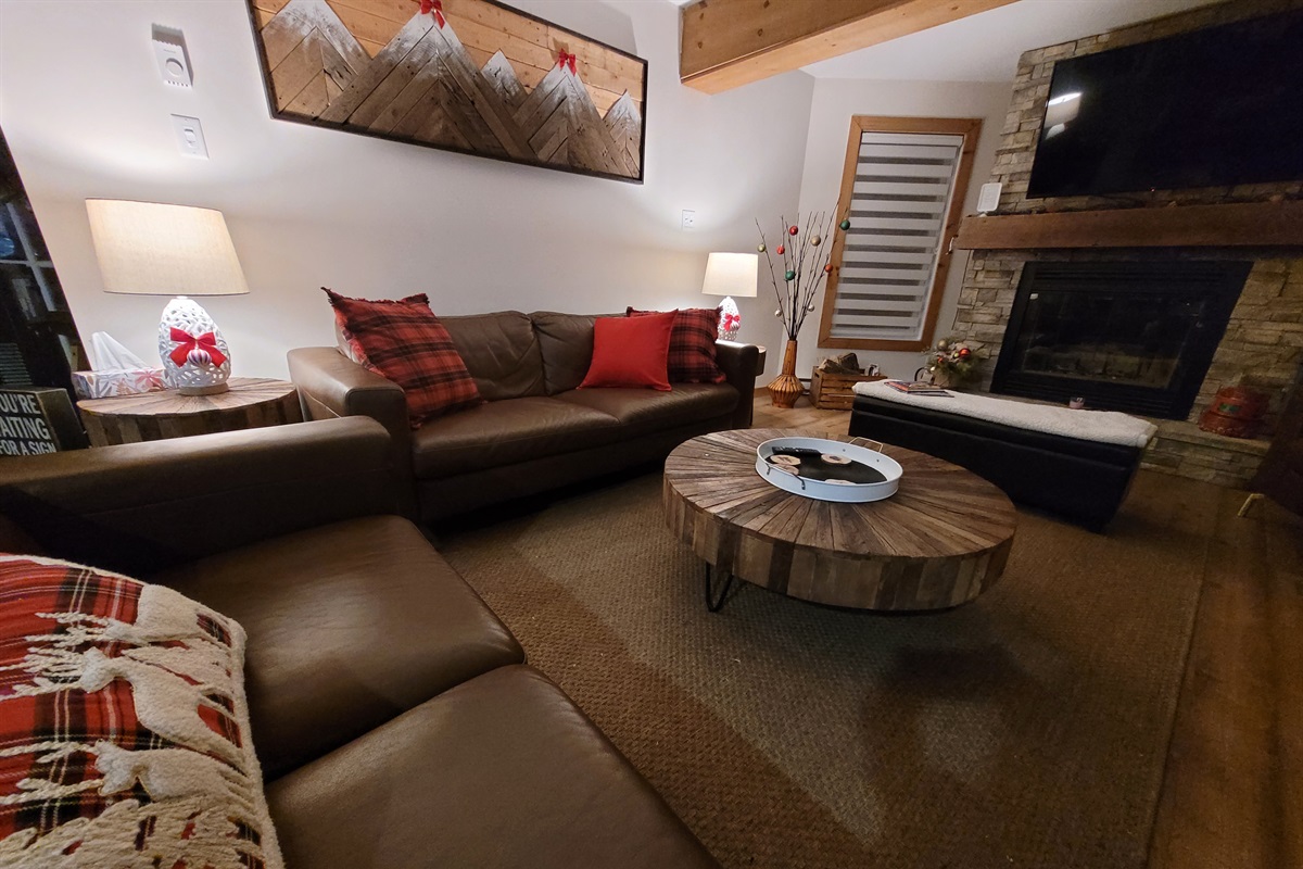 Cozy warmth from the wood-burniing fireplace is a perfect way to warm up in the winter season