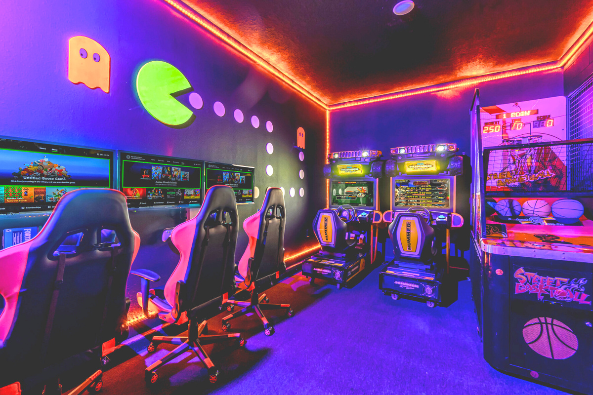 Pac-Man themed retro arcade with commercial games, X Box with unlimited game pass, mini basketball and more. Air-conditioned and with LED lights.