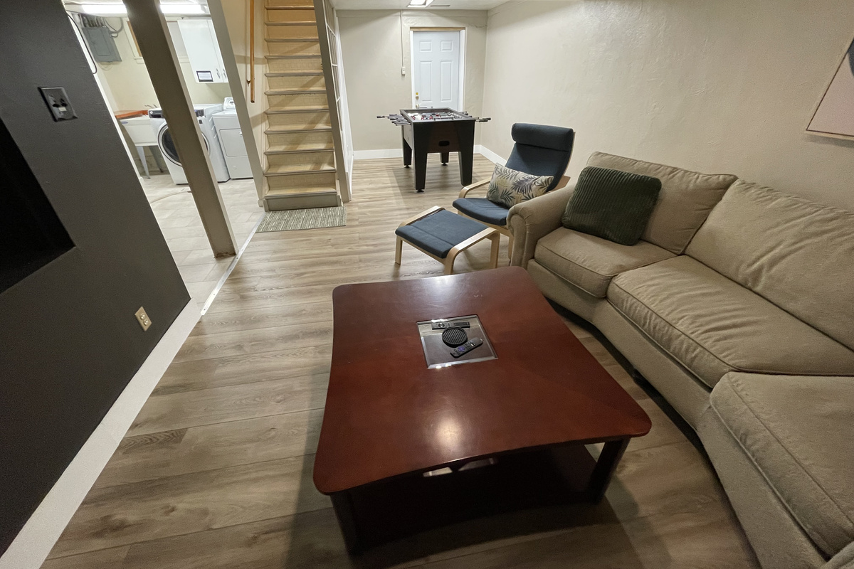 Lower level tv room with Xbox and games