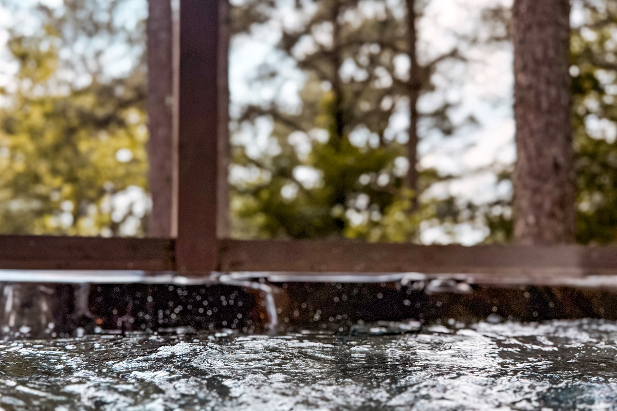 The hot tub makes evenings at The Americana feel like a private spa in the forest.