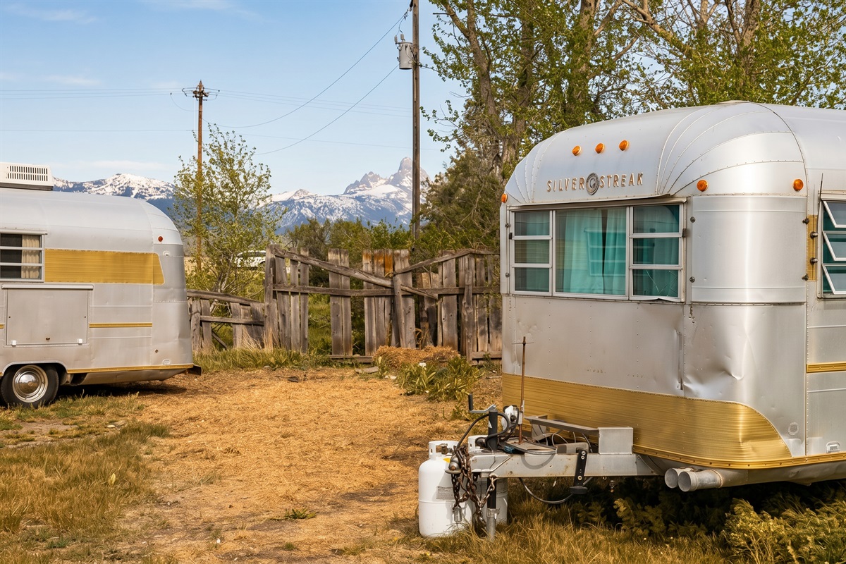 Waking up to the Grand Tetons framed right between your vintage-modern setups.