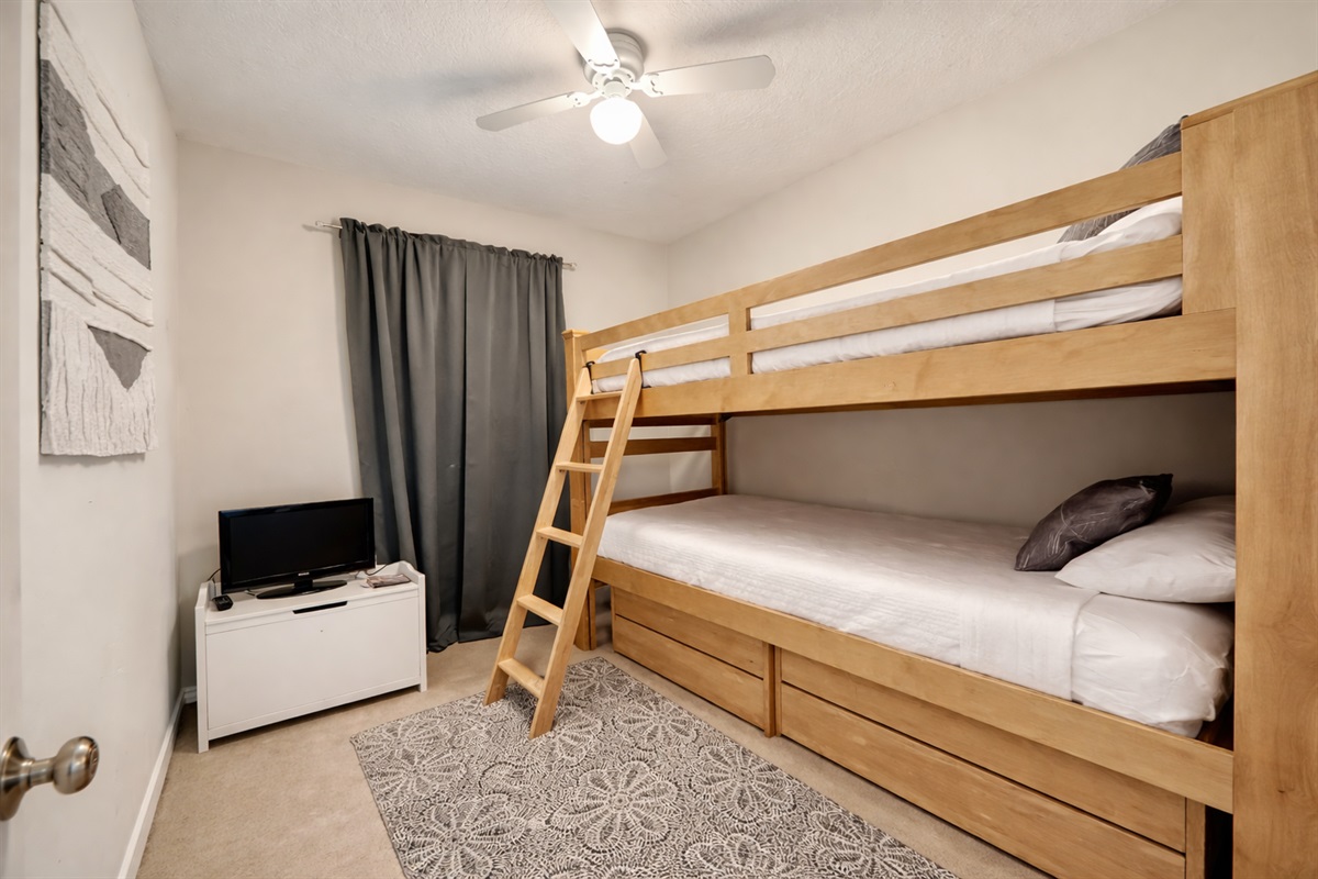 Bunk beds inside queen bedroom on top floor