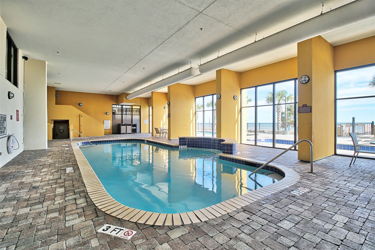 Views to the beach from the indoor pool