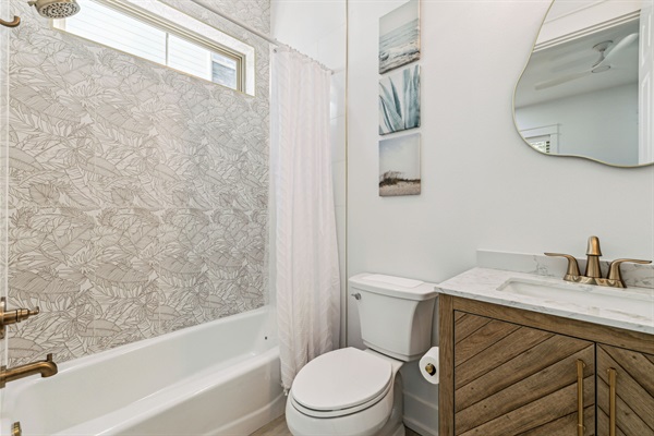 First Floor-Bathroom 1 (connected to sitting room/bedroom 1)  Amenities include:  travel-size shampoo & conditioner, small bar of hand soap, individual-wrapped cotton swabs-4 count, 2 makeup removal microfiber towels, mat for hot tools, and a hair dryer.  