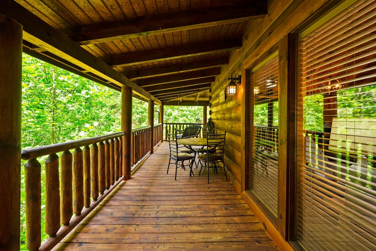 Side porch includes an outdoor dining area.  