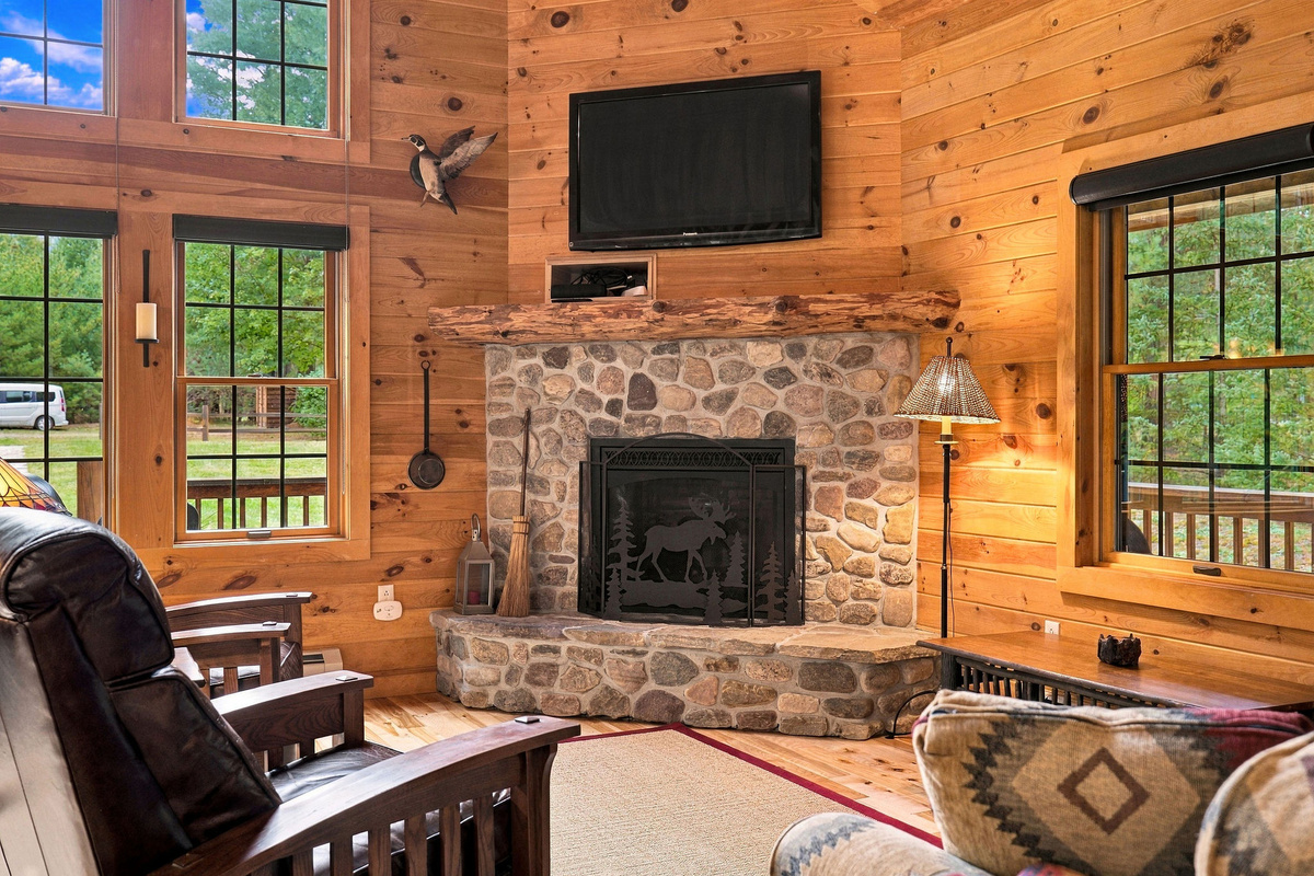 Gather around the stone fireplace after a day of exploring or skiing at Whiteface Mountain.