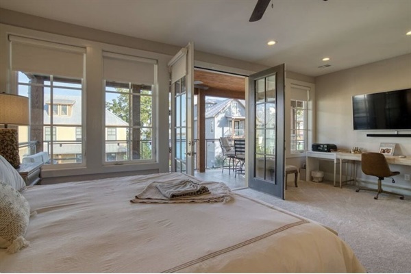 Master Suite with Balcony Seating with a view of the Lake