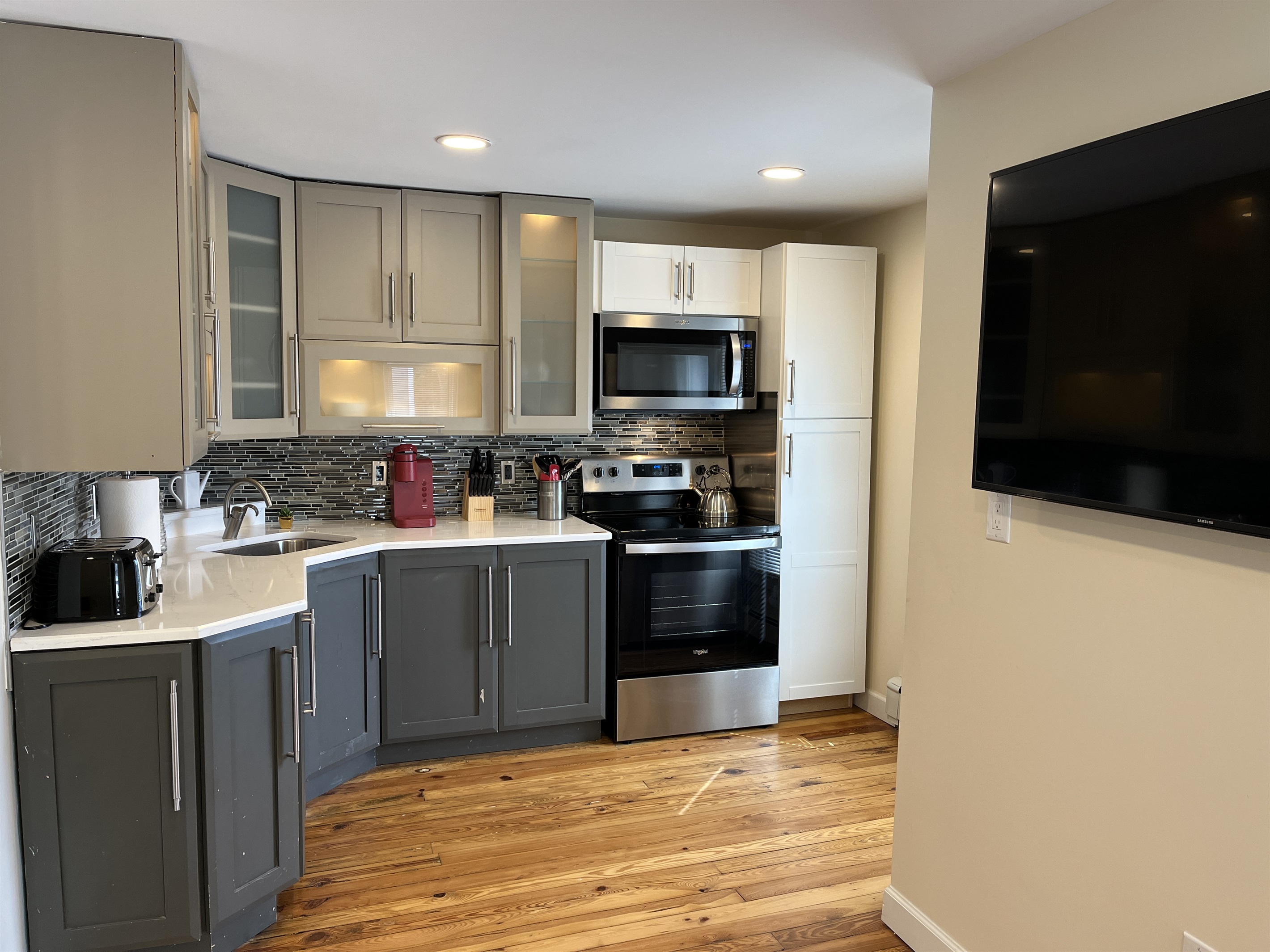 Open concept kitchen, living and dining area