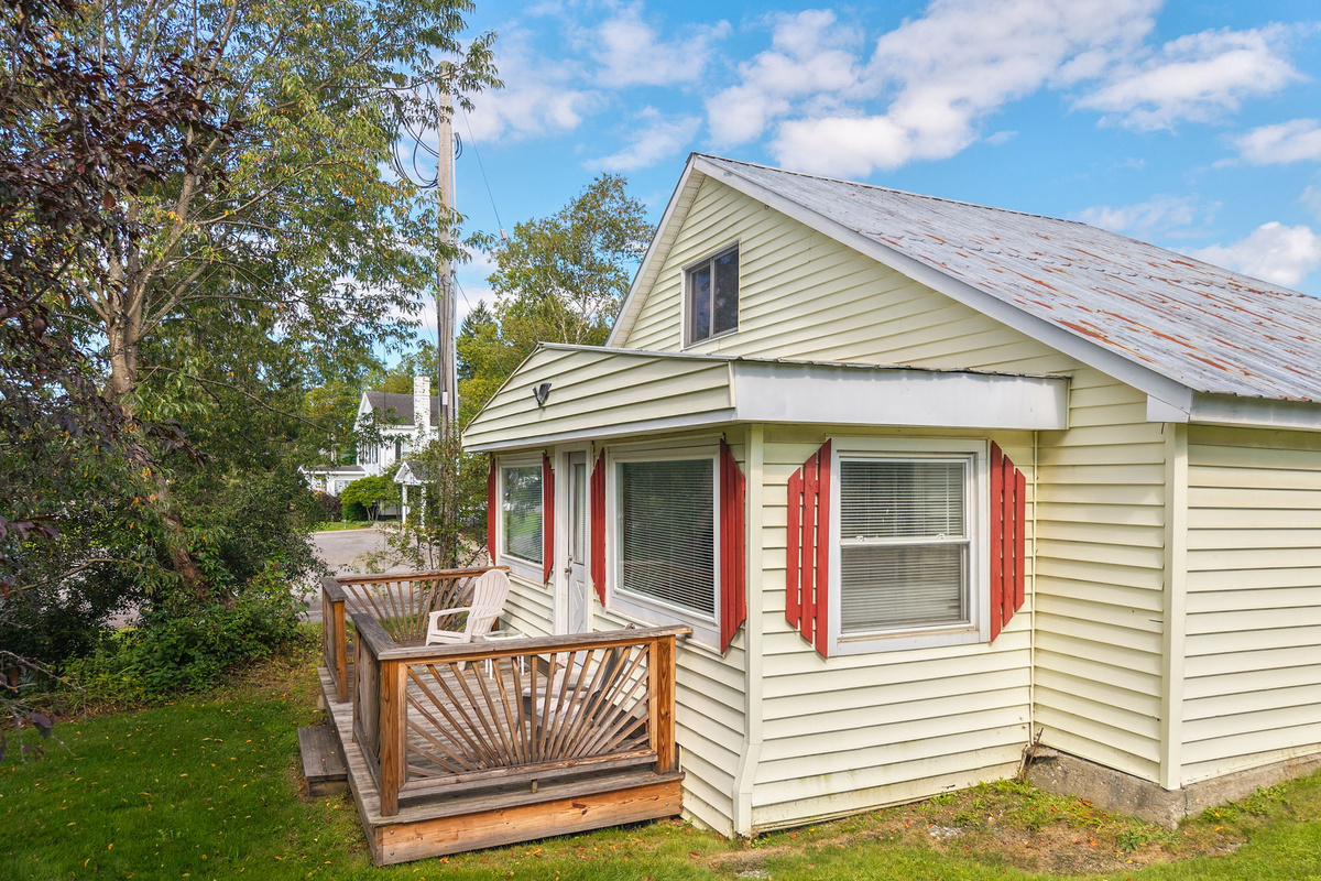 A welcoming front porch adds to the home's country charm.