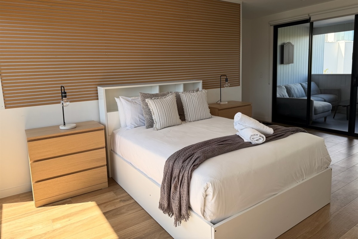 Bedroom 5 - TV, 2 balconies, sink and bar fridge