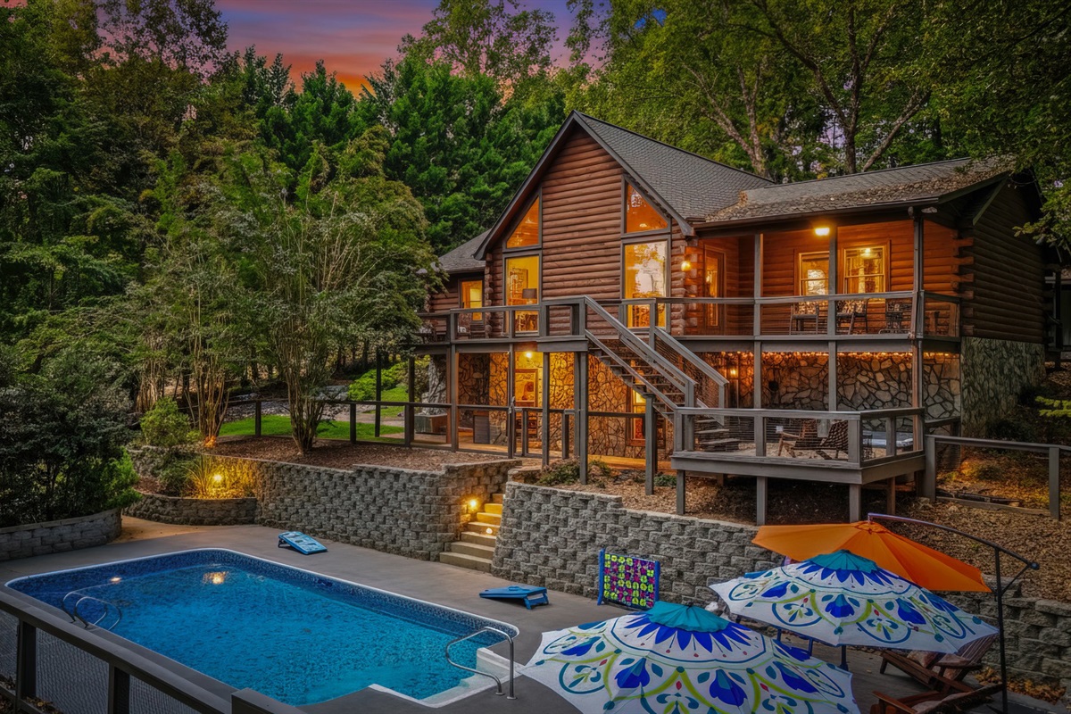 The multi-level decks and sparkling pool offer endless ways to enjoy the peaceful riverside setting.