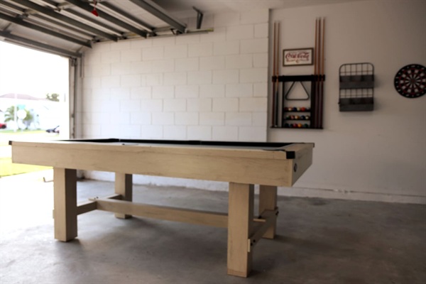 Garage game-room with pool table and kid-friendly magnet dart board (no air-conditioning in the garage).  