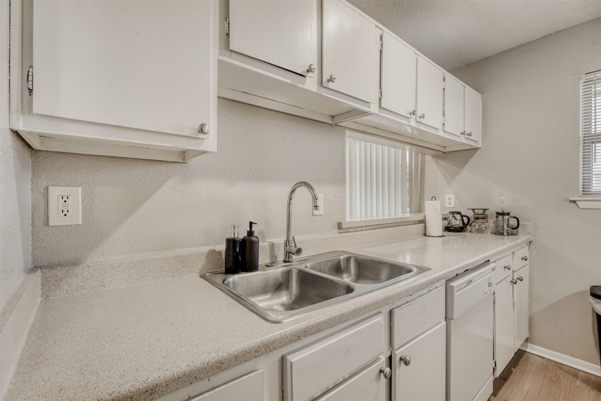 Bright and clean kitchen with modern essentials.