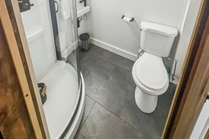 Small fully equipped bathroom.