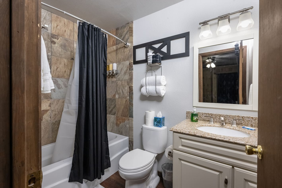 Bathroom off bedroom #1 with shampoo, conditioner and body wash provided