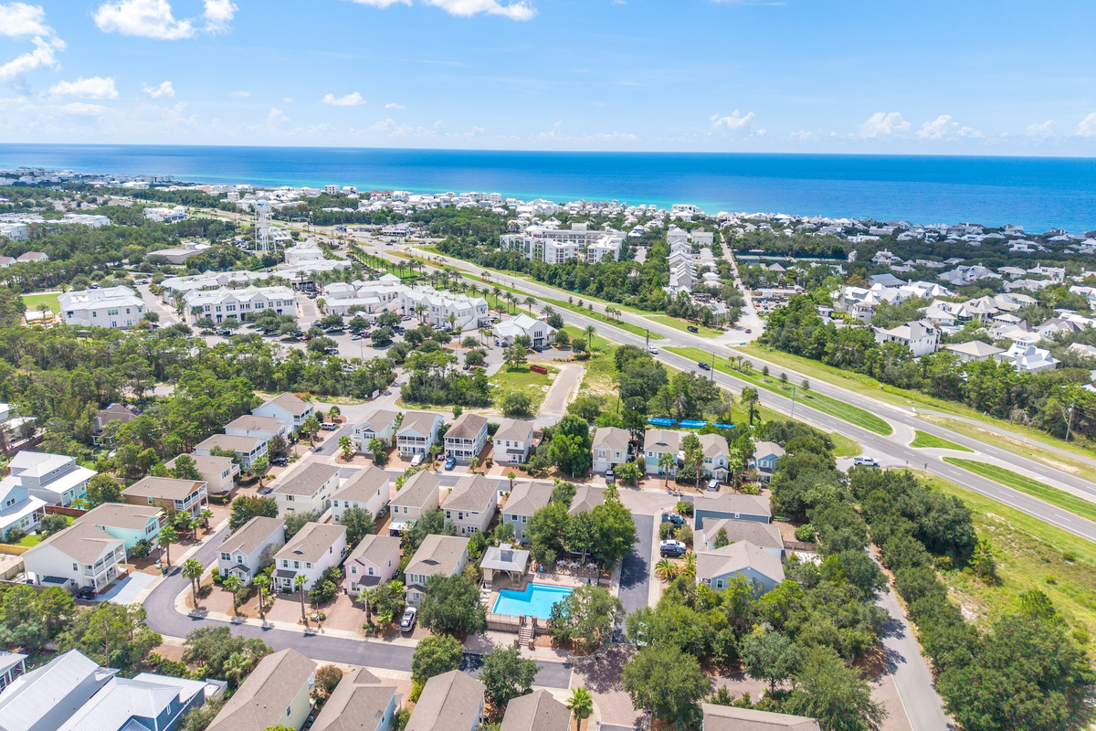 Aerial View: This perspective highlights the home's unbeatable proximity to the heated pool, multiple beach access points, Rosemary and 30Avenue shops.