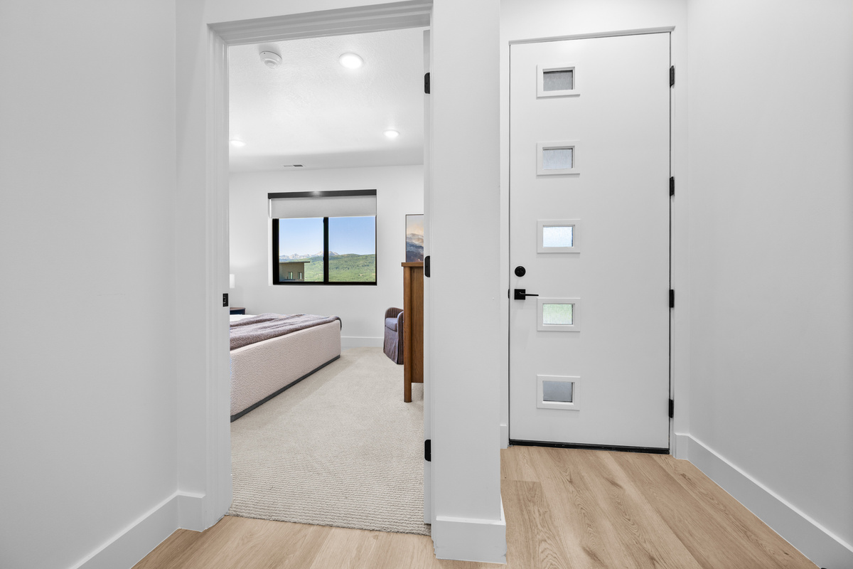 The welcoming entryway provides easy access to the main living area and is close to the first-floor bedroom.