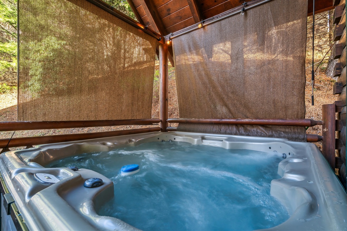 Relax and unwind in your private hot tub