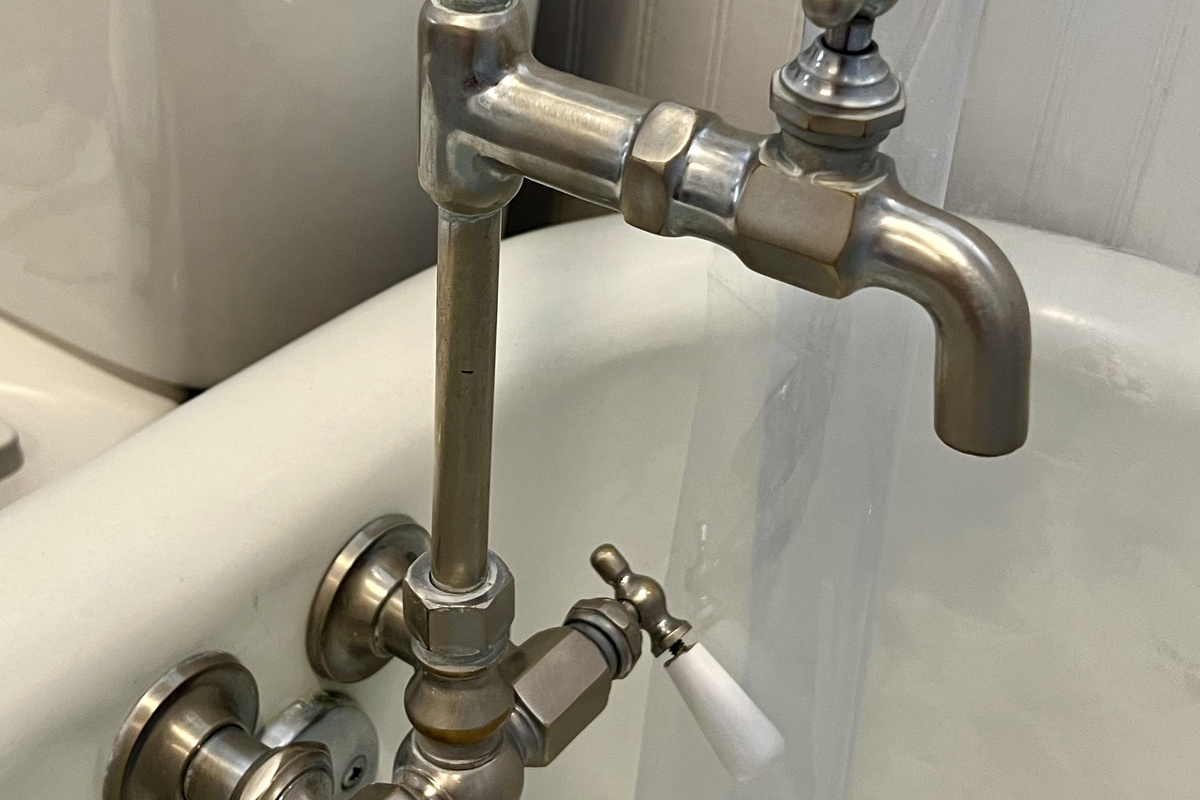 Deep soaking vintage style clawfoot tub and faucet