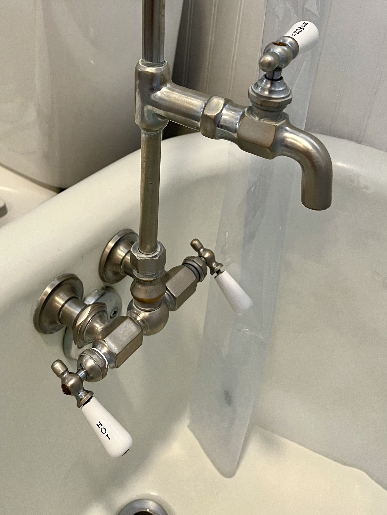 Deep soaking vintage style clawfoot tub and faucet