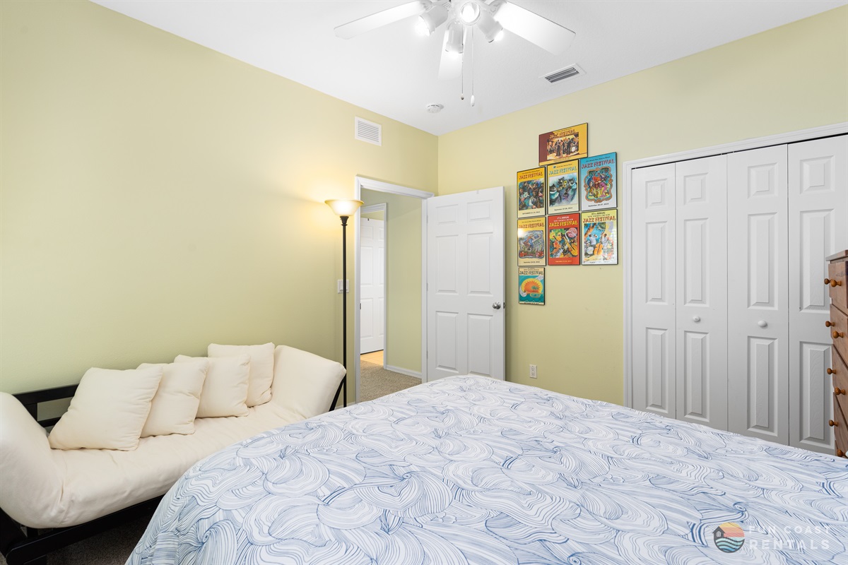 Queen bedroom with walk-in closet.