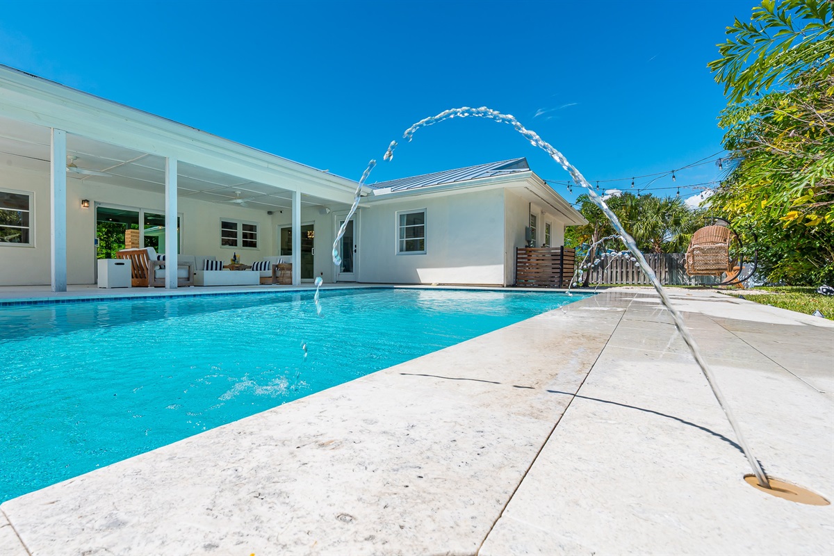 Heated saltwater pool with deck jets and color-changing LED lights. Perfect spot to soak up the sunshine and take a dip any time of day.