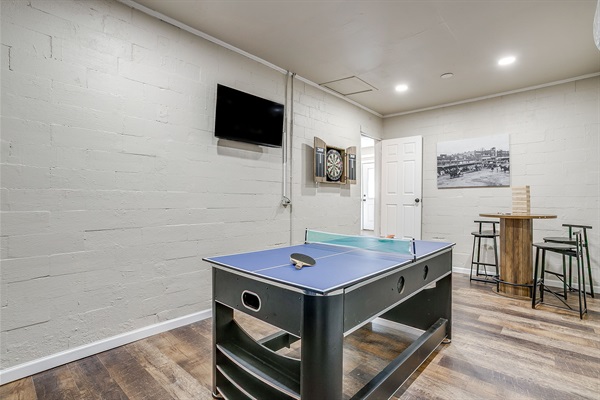 Game room entertainment with ping pong table and high-top bar seating