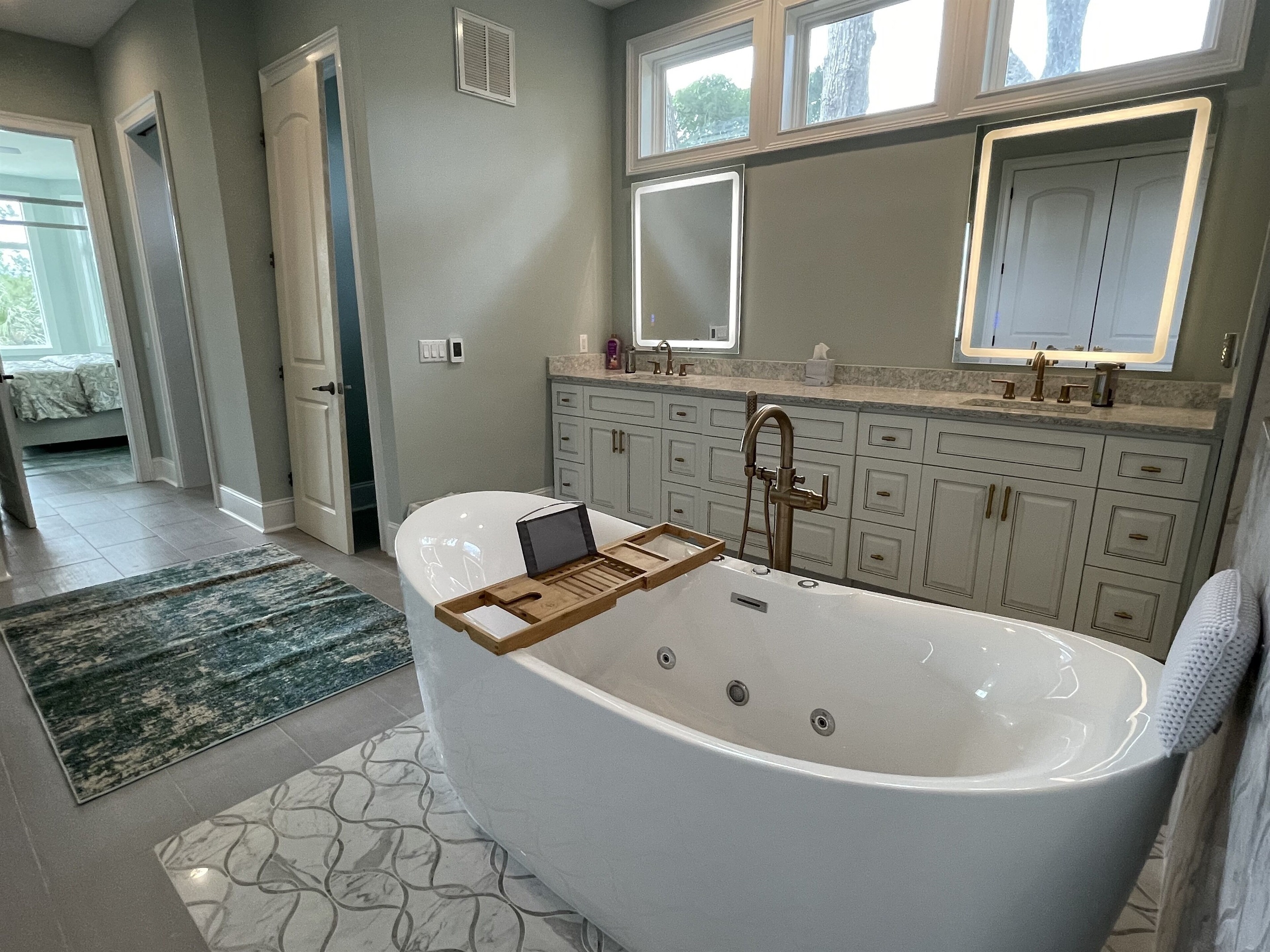 Ensuite Primary spa bath w/huge shower, whirlpool/air bubble tub & heated floors