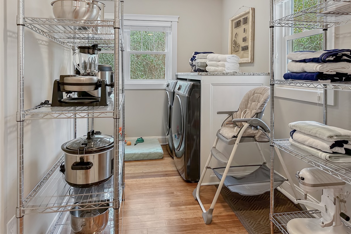 Off the Kitchen is the Laundry / Pantry Room, where you'll find extra appliances, a high chair...