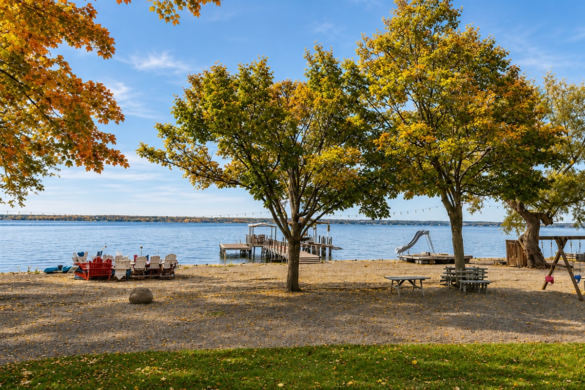 Sandy shoreline and calm waters ideal for swimming and kayaking.