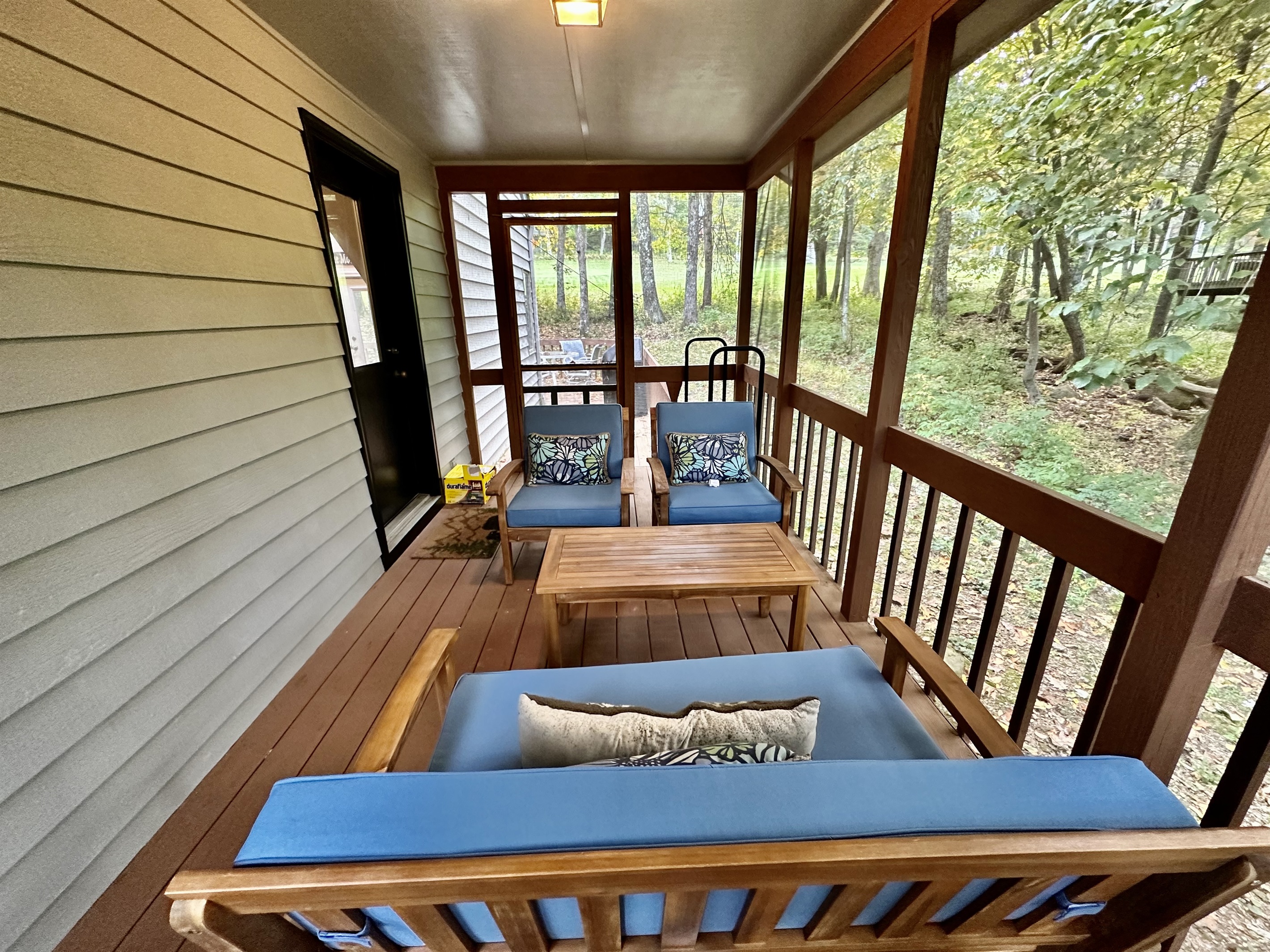 screened in porch just outside the kitchen door