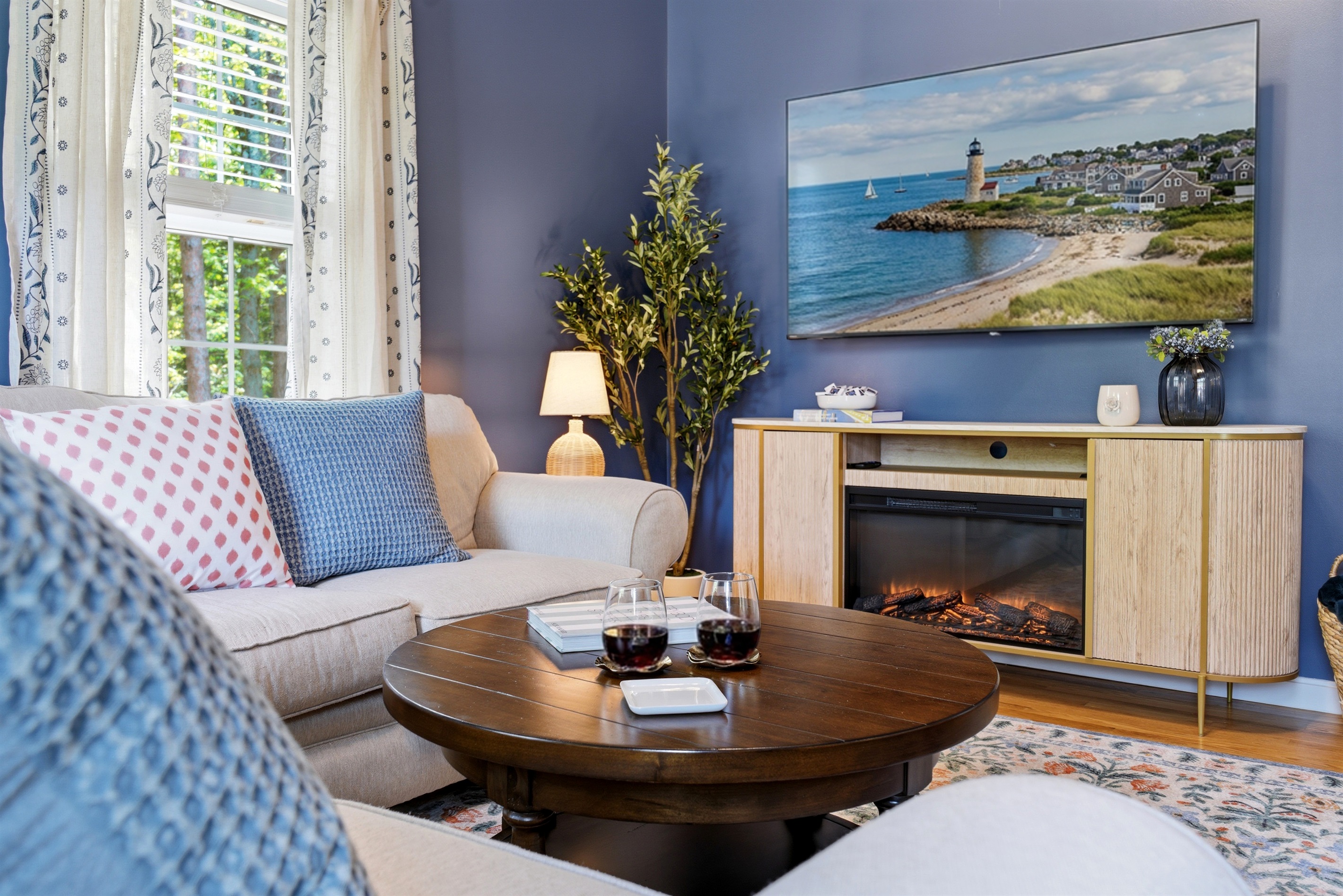 A warm and inviting living room designed for comfort, relaxation, and memorable moments with your group.
