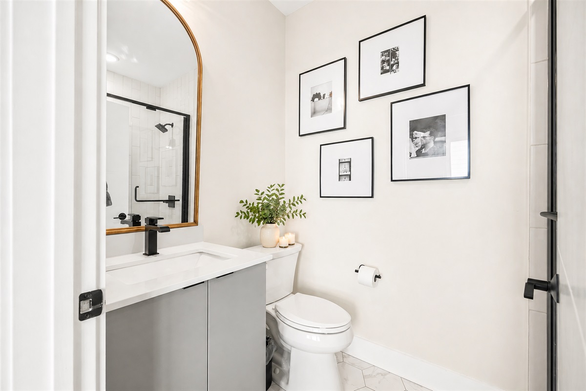 Just steps from the 3rd floor queen bedroom, this private ensuite offers a walk-in shower and everything you need to refresh with ease.