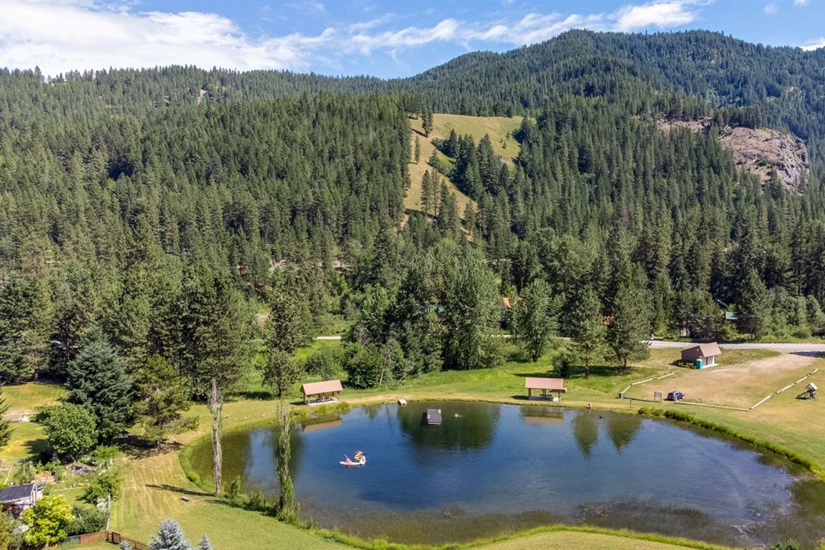 Community pond and floating docks for summer swimming and picnics.