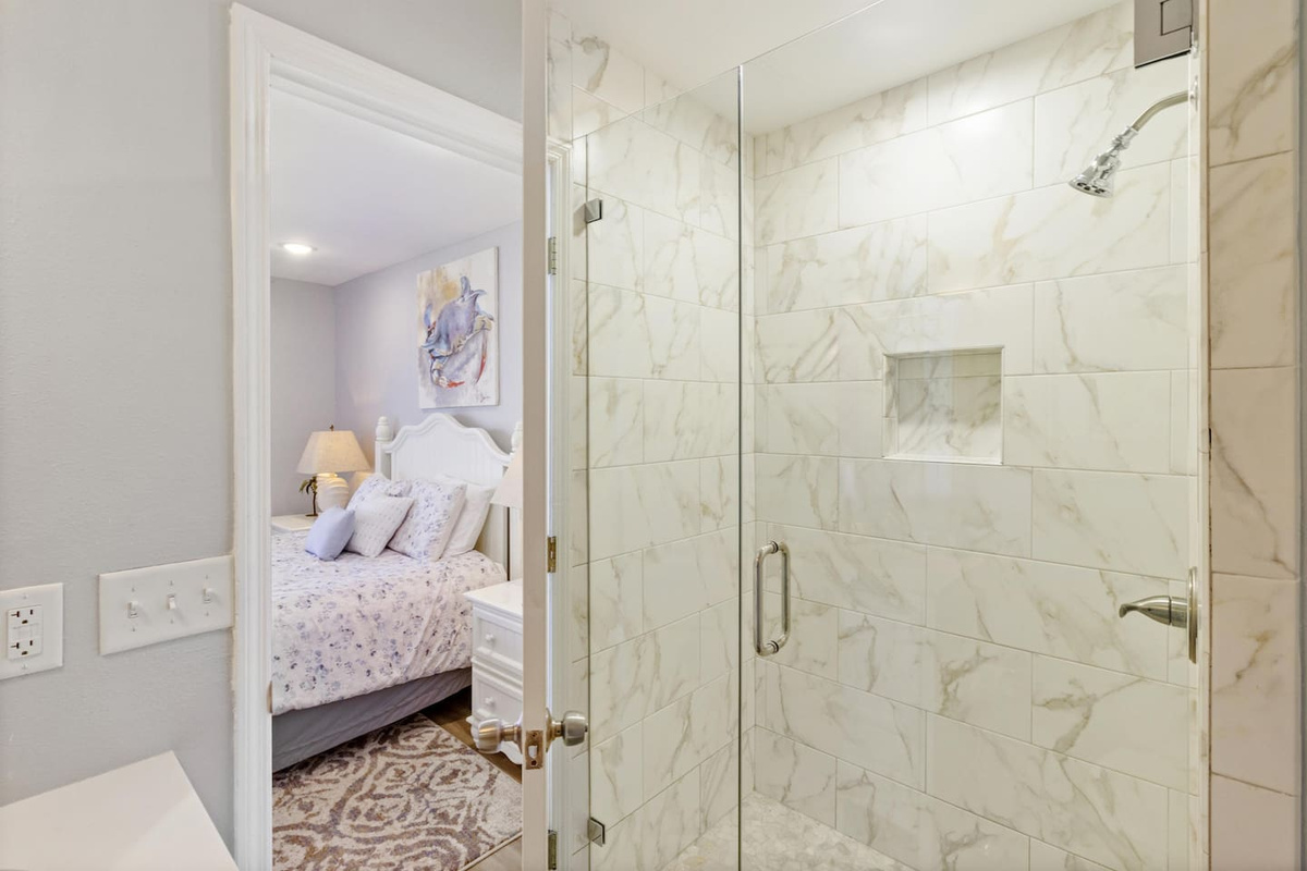 Step into the guest ensuite walk- in shower after a long day on the beach &mdash; hot water, good pressure, done.