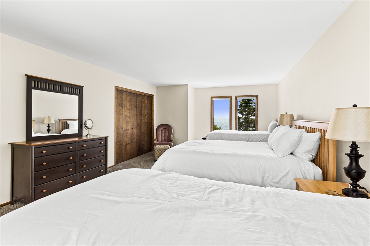 One queen, two twin beds and pack and play in the closet. Perfect for a whole family.