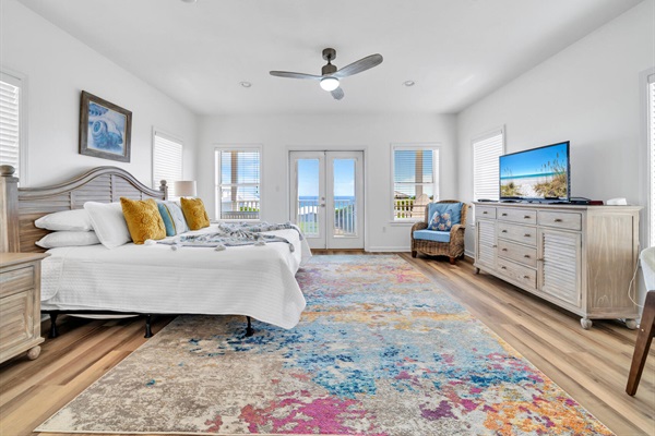 The huge third-floor primary bedroom has an ensuite bath and SPECTACULAR gulf and sunset views!