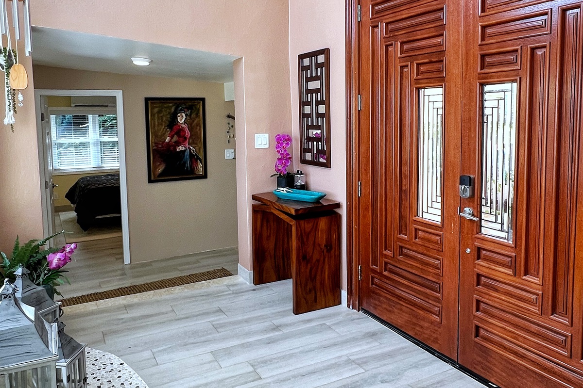 Head back out towards the entrance and go across the second guest bedroom.