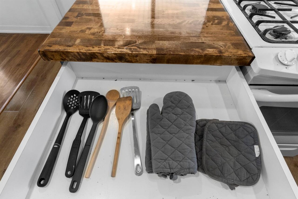 Utensils and hot pads for making your meal at home.