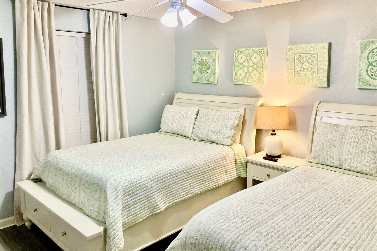 Drawers under both beds for clothes storage!